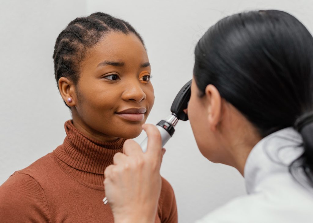 Services 3 close up doctor checking patient eye